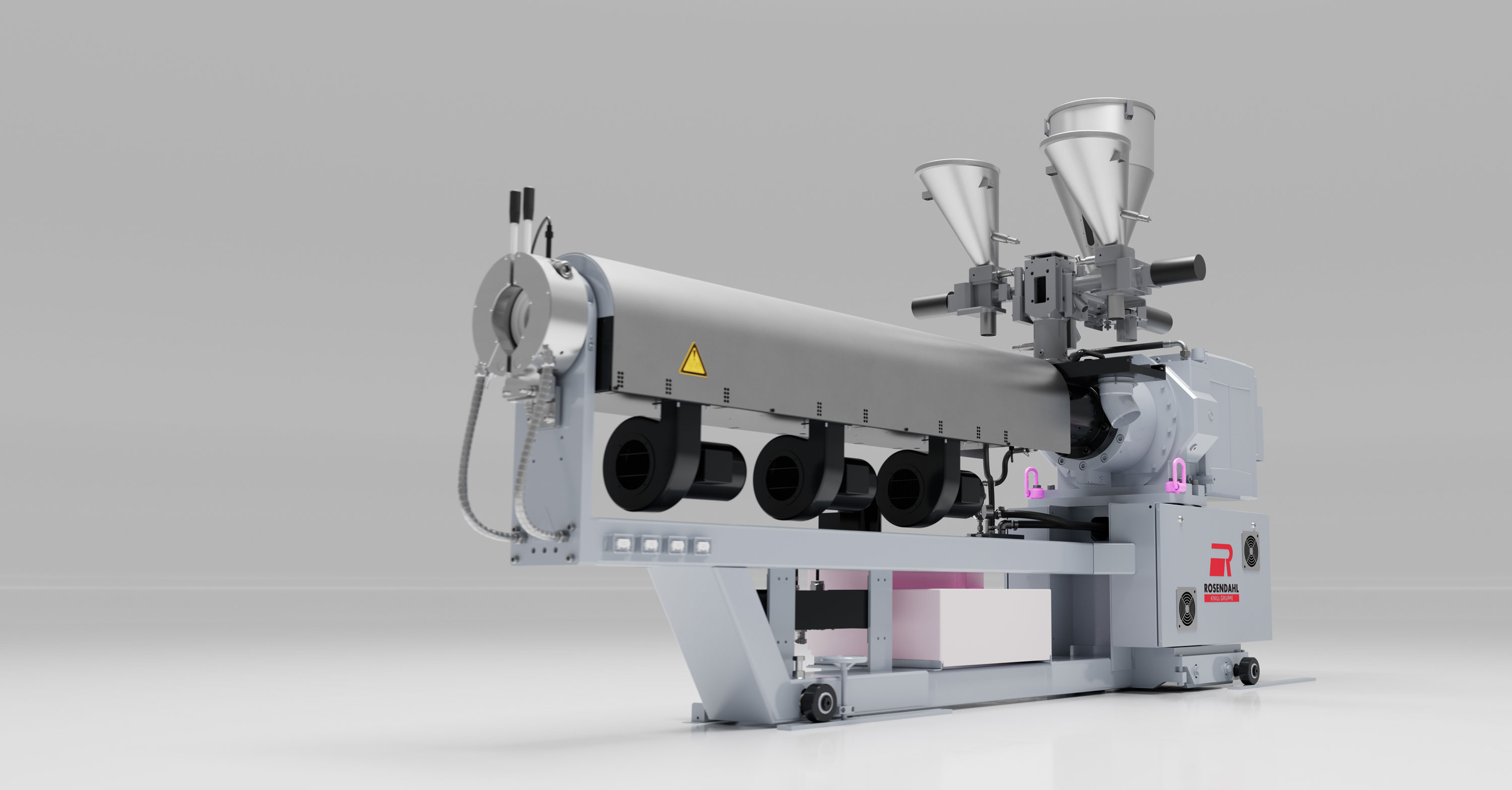 Industrial extrusion machine from Rosendahl Nextrom used in cable manufacturing processes, featuring multiple rollers and control panels for precise operation.